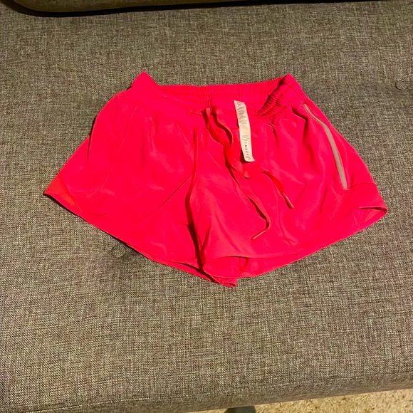 Pink Lululemon size 4 running shorts - Picture 1 of 1